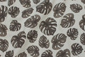 Deko-fabric in linen-look with dirt-colored filodendron leaves Deko-fabric in linen-look with dirt-colored filodendron leaves