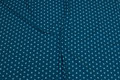 Petrol cotton-jersey with light turqoise 1 cm stars Petrol cotton-jersey with light turqoise 1 cm stars