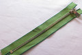 Green striped gold zipper 18cm length, not divisible Green striped gold zipper 18cm length, not divisible