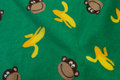 Grass green fleece with monkies and bananas Grass green fleece with monkies and bananas