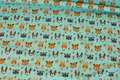 Mint-green cotton-jersey with small 2 cm animal heads Mint-green cotton-jersey with small 2 cm animal heads