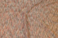 Lightweight knit in melon and sand-colored with gold hints Lightweight knit in melon and sand-colored with gold hints