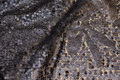 Beautiful net-fabric, in dark brungrÃ¥, with sewn-on sequins Beautiful net-fabric, in dark brungrÃ¥, with sewn-on sequins