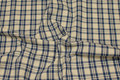 Checked, firm cotton in light beige and dove-blue Checked, firm cotton in light beige and dove-blue
