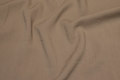 Polyester and viscose in dark beige with lightweight crinkle surface Polyester and viscose in dark beige with lightweight crinkle surface