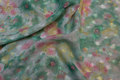 Semi-transparent polyester chiffon in light green and soft red Semi-transparent polyester chiffon in light green and soft red