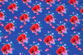 Cobolt-blue cotton-jersey with red 5 cm poppies Cobolt-blue cotton-jersey with red 5 cm poppies