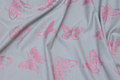Light grey cotton-jersey with pink glitter-butterflies Light grey cotton-jersey with pink glitter-butterflies