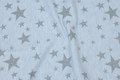 Softened winter-sweatshirt-fabric in speckled light blue with stars in glittersølv Softened winter-sweatshirt-fabric in speckled light blue with stars in glittersølv