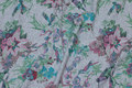 Grey-speckled, lightweight sweatshirt fabric with birds and flowers Grey-speckled, lightweight sweatshirt fabric with birds and flowers