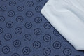 Denim-blue cotton-jersey with smilies with soft white fleecebagside Denim-blue cotton-jersey with smilies with soft white fleecebagside