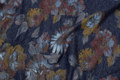 Speckled navy heavyjersey with golden and brown flowers Speckled navy heavyjersey with golden and brown flowers