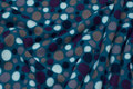 Petrol-colored fleece with dots in purple and dirt-colored Petrol-colored fleece with dots in purple and dirt-colored