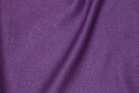 Furniture fabric in speckled dark purple with light back