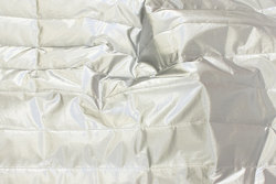 Coated quilt in silver-colored for jackets and vests etc.