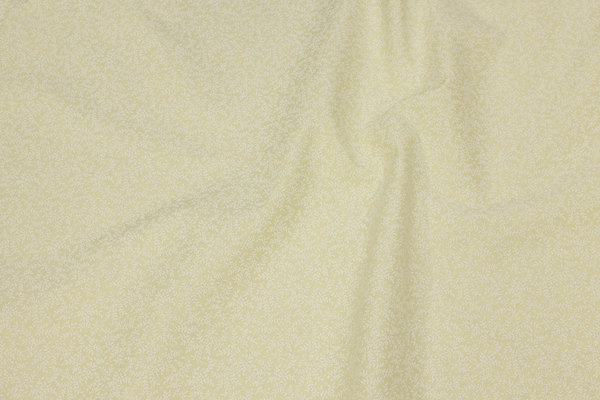 Creme-colored patchwork cotton with mini branch-pattern
