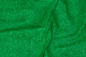 Firm, grass green cotton with speckles