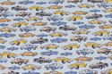 Firm, light blue cotton with cars