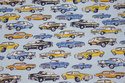 Firm, light blue cotton with cars