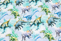 Light blue-turqoise cotton-jersey with ca. 7-10 cm dinosaurs