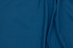 Organic sweatshirt fabric with stretch in light petrol-blue with softened back