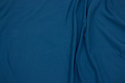 Organic sweatshirt fabric with stretch in light petrol-blue with softened back