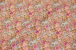 Soft red cotton with small flowers in light blue and pink