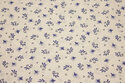 White cotton with small blue pattern