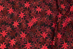 Black cotton-jersey with ca. 3 cm coral-red flowers