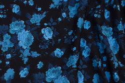 Black cotton-jersey with ca. 2-5 cm blue roses