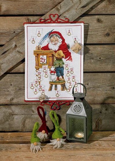 Christmas calendar with santa claus and small boy