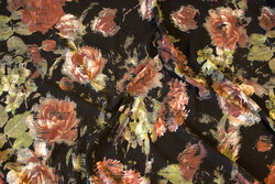 Black viscose jersey with brown and green flowers