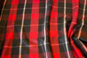 Coat-fabric in black and red checks