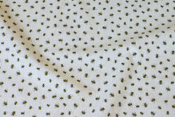 Medium-thickness cotton and polyester linen-colored with ca. 1 cm bees