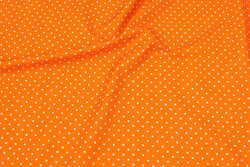 Orange cotton with white dots