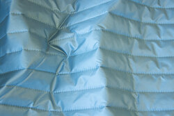 Smooth quilt in light petrol with lining-back