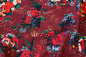 Wine-red christmas jersey with santas and roses
