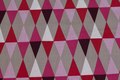 Cotton with domino-pattern in red, soft red, sand
