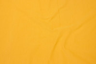 Cotton-jersey in brass-yellow