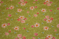 Light olive-green cotton with soft red flowers