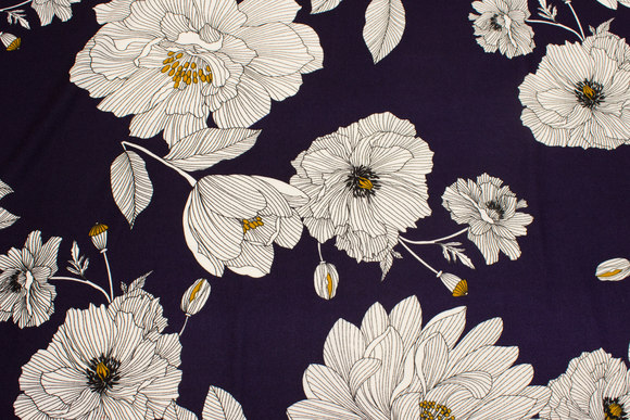 Navy, lightweight polyester crepejersey with big white flowers.