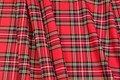 Tartan checker fabric in red, black, white and yellow