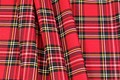 Tartan checker fabric in red, black, white and yellow
