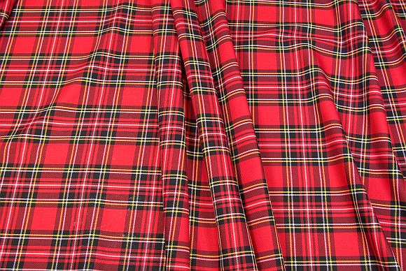 Tartan checker fabric in red, black, white and yellow