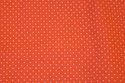 Firm, coral-color cotton with white mini-dots