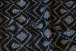 Firm, felt knit in black and grey domino pattern