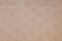 Light sand-colored coated fabric with pattern
