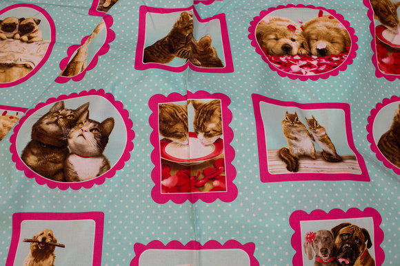 Mint-green patchwork cotton with cats-and dog portraits