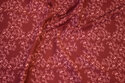 Wine-red, firm cotton with coral flowers