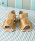 Babies´ Rompers, Sandals, and Stuffed Duck